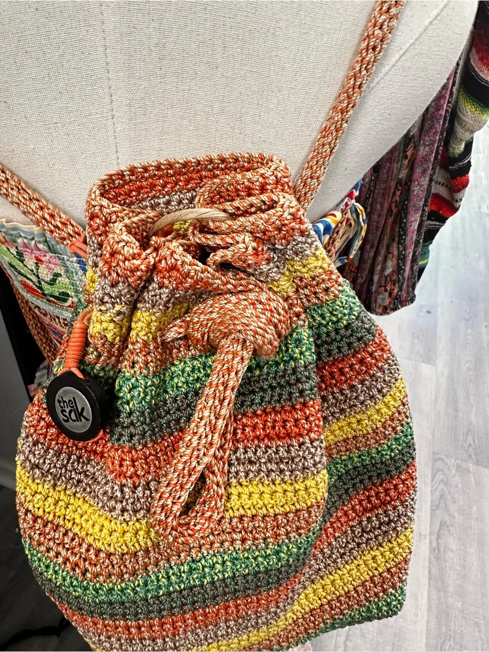 The Sak Crochet Striped Drawstring Bucket Bag Crossbody Boho